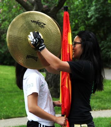 Huron High School Drum Line members prepare to march in the Ann Arbor Glacier Area Homeowners Association Memorial Day Parade on Monday, May 27. Ben Freed I AnnArbor.com